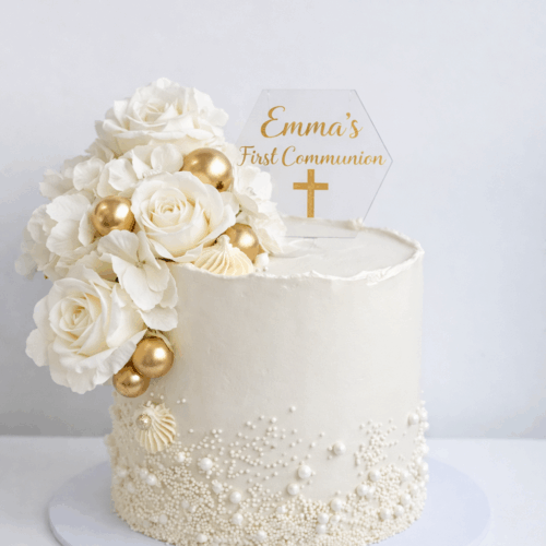 Elegant pearl and floral communion cake