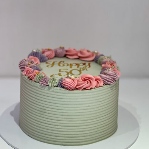 Comb Texture and Piped Wreath Celebration Cake (Next Day)